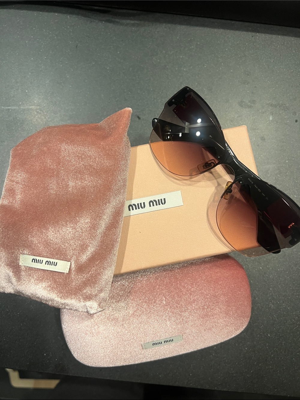 Miu Miu Black Frame Sunglasses with Brown Gradient Lenses and Pink Velvet Pouch